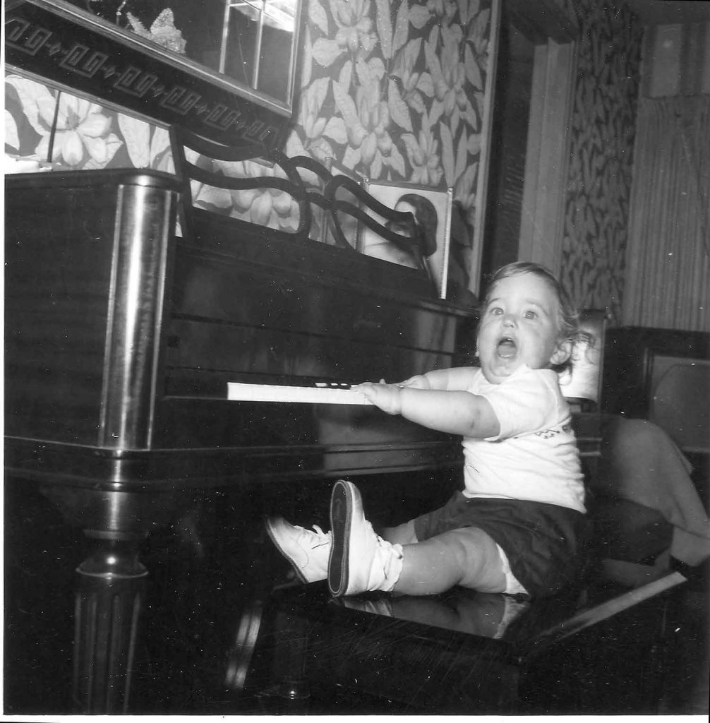1956. Mom and Dad played piano a little bit from time to time. The first song I learned on that piano was 'My Country Tis of Thee'. Go figure :)